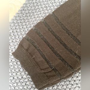 BNWOT Black sweater with sparkling transparent stripes.